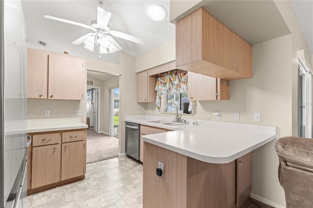 kitchen with kitchen peninsula, sink, dishwasher, and light brown cabinets