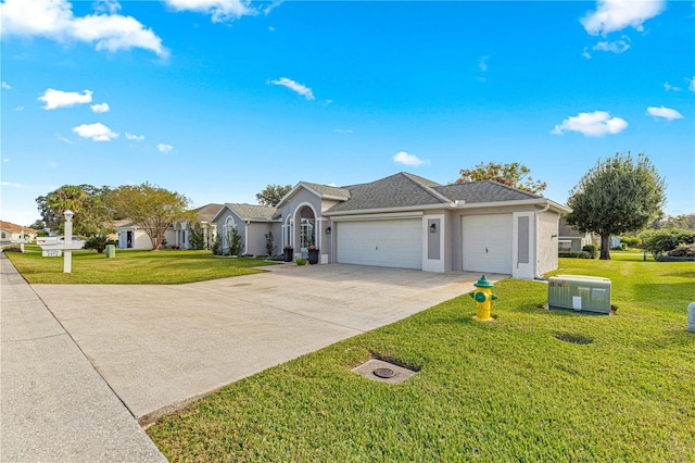 ranch-style house with a garage and a front lawn