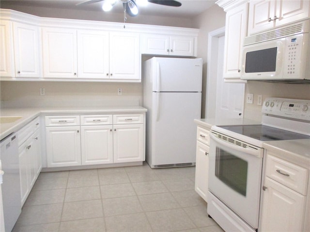 kitchen featuring white cabinetry, ceiling fan, white appliances, and light tile patterned floors