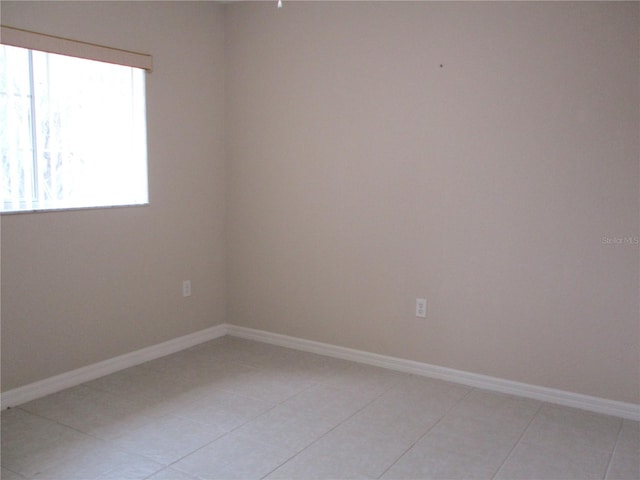 view of tiled spare room