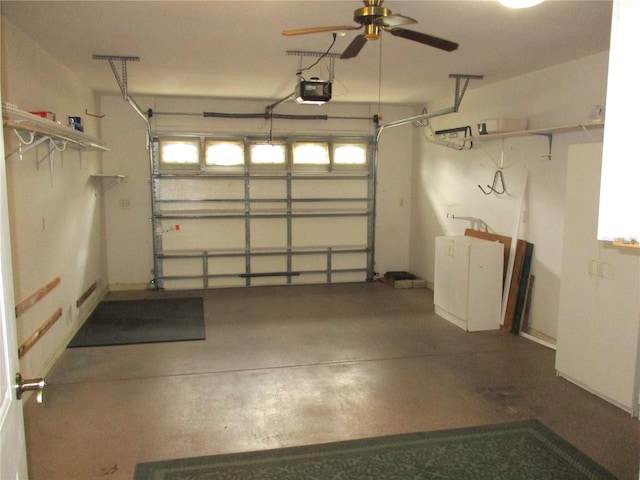 garage featuring a garage door opener and ceiling fan