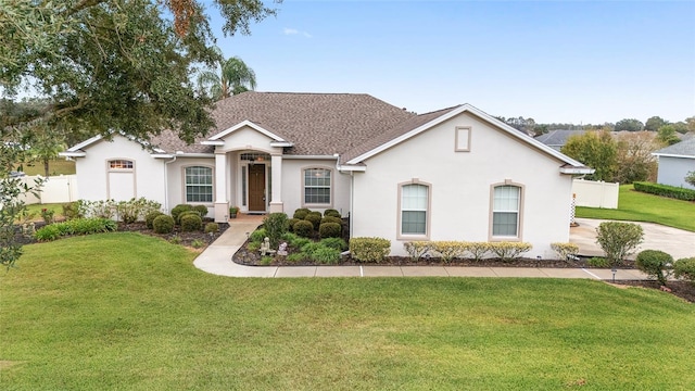 ranch-style house with a front yard