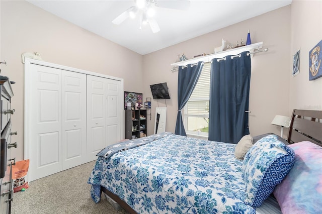 bedroom with carpet, ceiling fan, and a closet