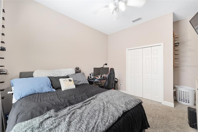 bedroom featuring a closet, carpet, and ceiling fan