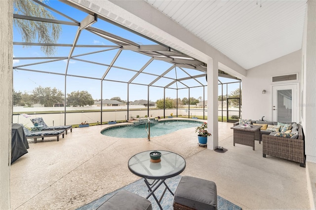 view of swimming pool featuring glass enclosure, a patio area, an outdoor living space, and pool water feature