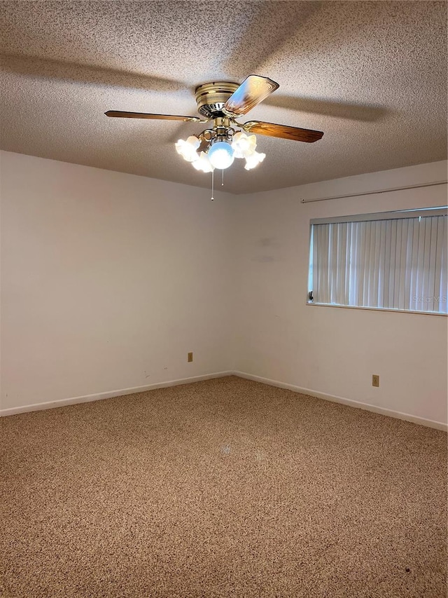 unfurnished room featuring carpet, a textured ceiling, and ceiling fan