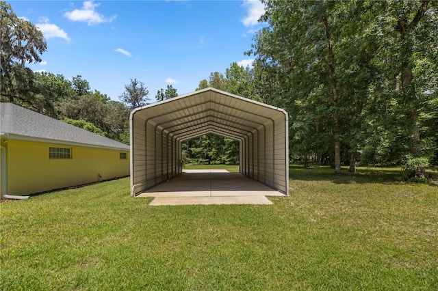 view of parking featuring a lawn and a carport