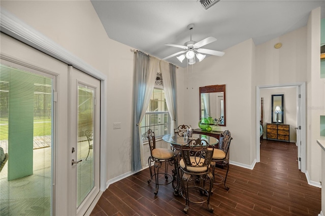 dining space featuring ceiling fan and dark hardwood / wood-style floors