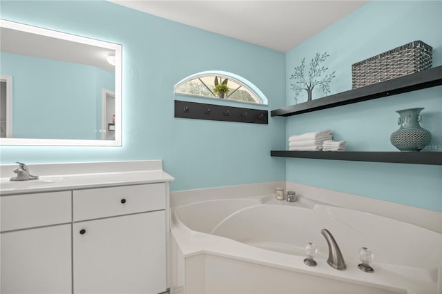 bathroom featuring a tub and vanity