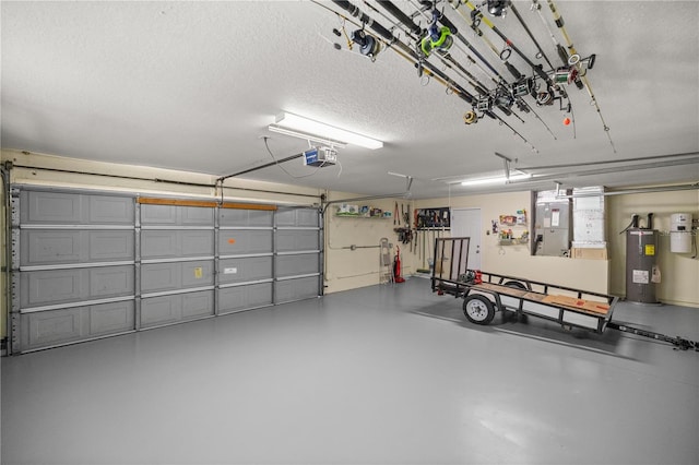 garage featuring a garage door opener and electric water heater