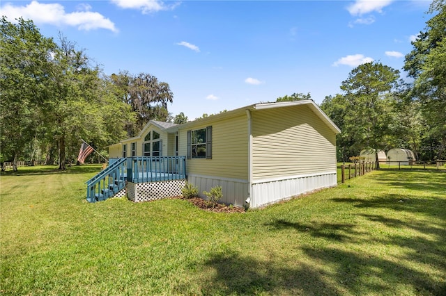 view of property exterior featuring a yard