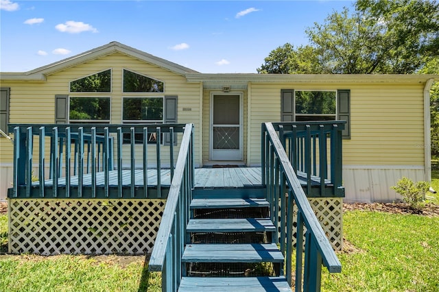 entrance to property featuring a deck