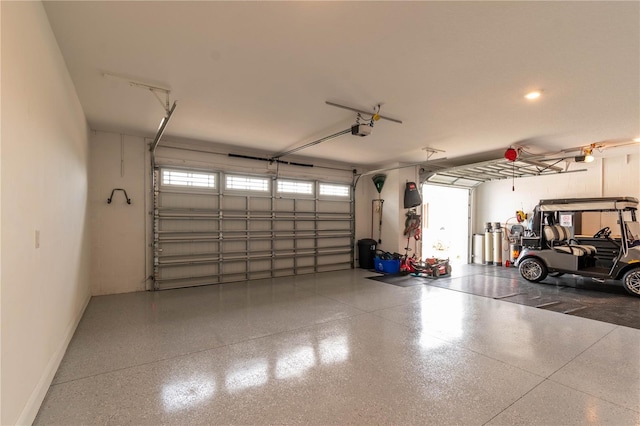 garage featuring a garage door opener