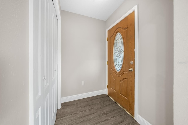 entryway with dark wood-type flooring