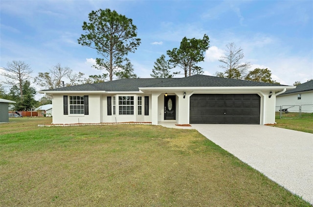 single story home with a garage and a front lawn