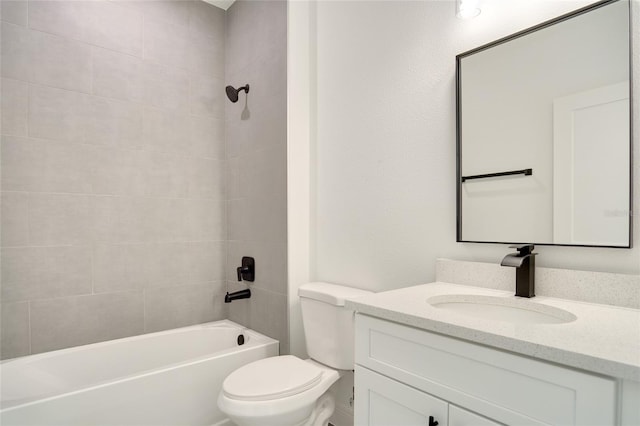 full bathroom featuring vanity, toilet, and tiled shower / bath