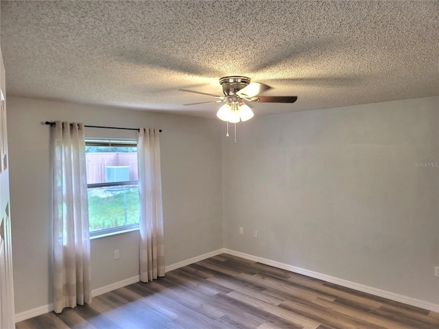 unfurnished room with wood-type flooring, ceiling fan, and a textured ceiling