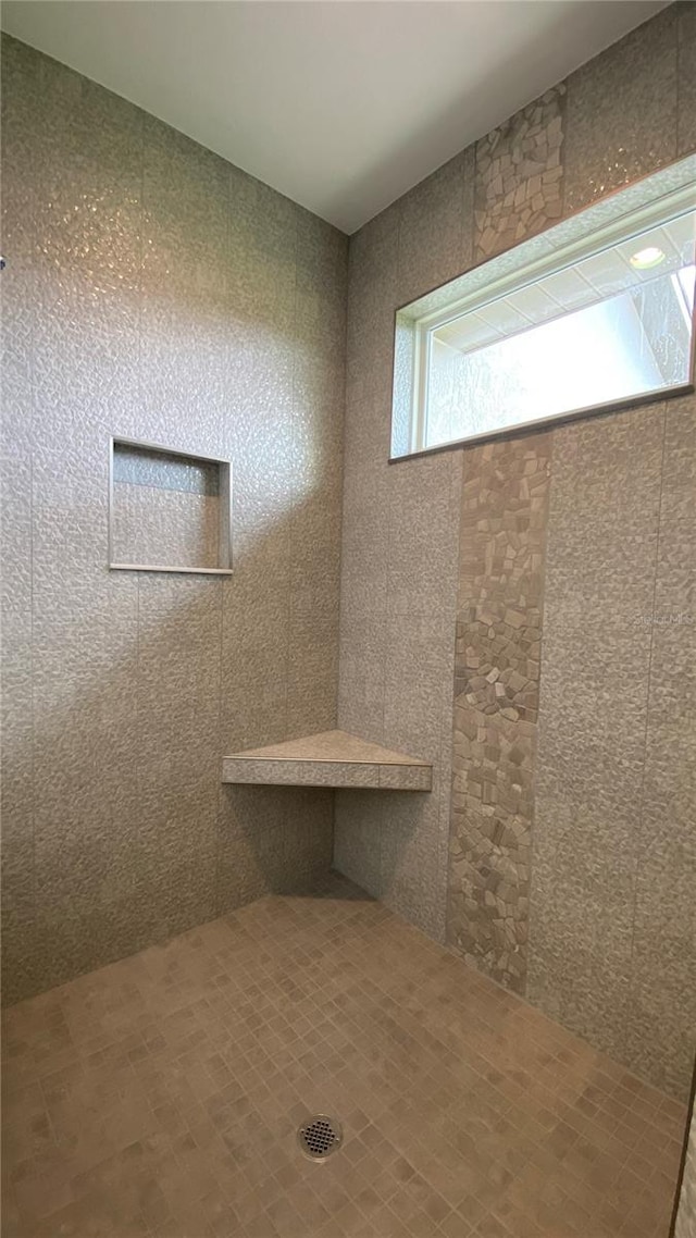 bathroom featuring a shower