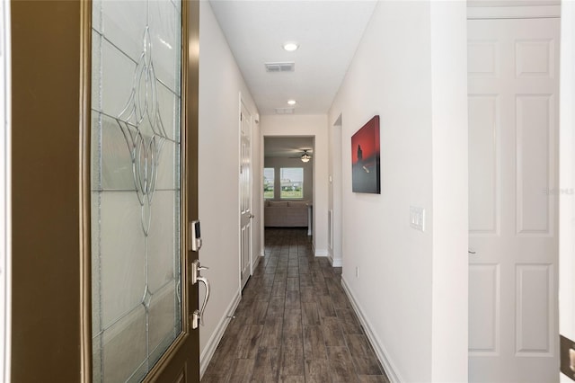 corridor featuring dark wood-type flooring