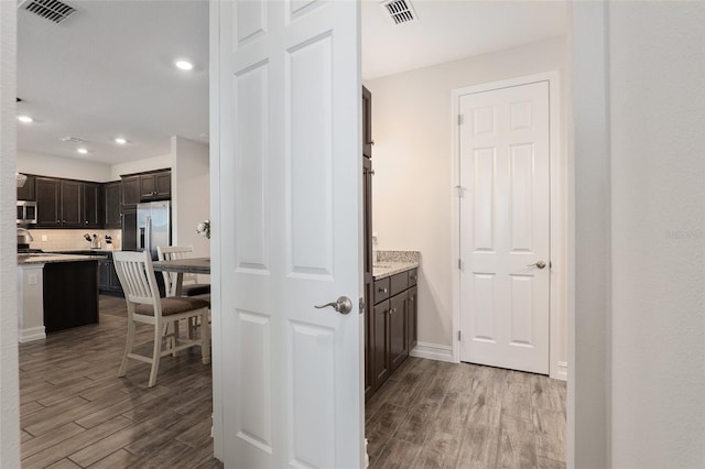 hallway featuring light hardwood / wood-style floors