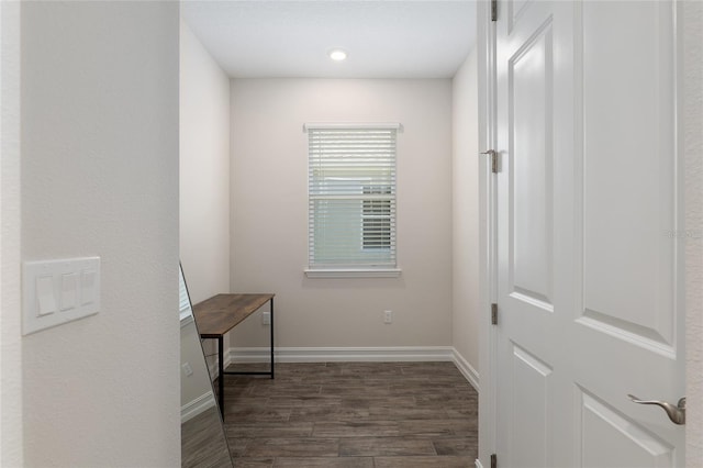 interior space with dark wood-type flooring