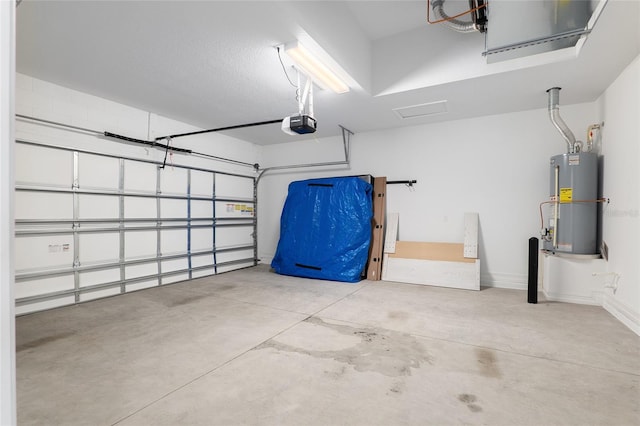 garage featuring a garage door opener and gas water heater