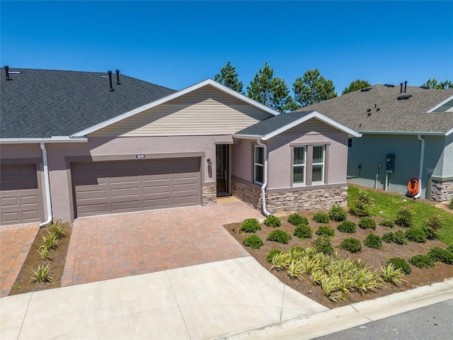 single story home with a garage