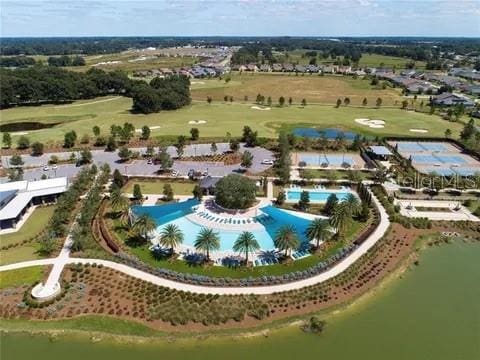 birds eye view of property featuring a water view