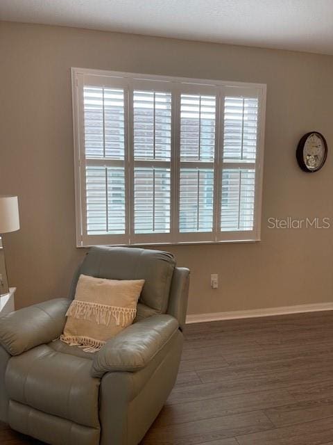 living area featuring hardwood / wood-style flooring