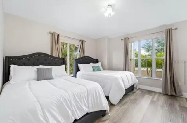 bedroom featuring light wood-type flooring