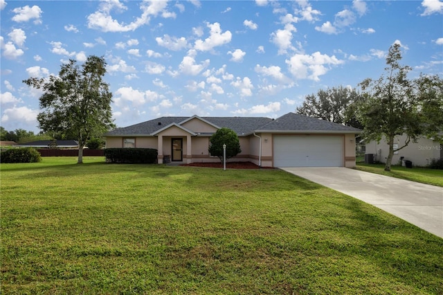 ranch-style home with a front yard and a garage