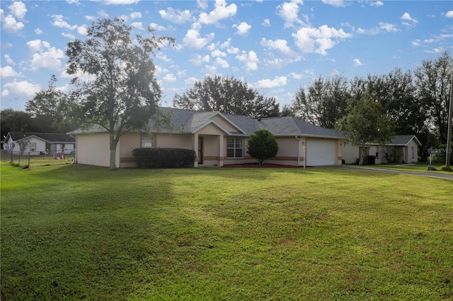 ranch-style house with a garage and a front yard