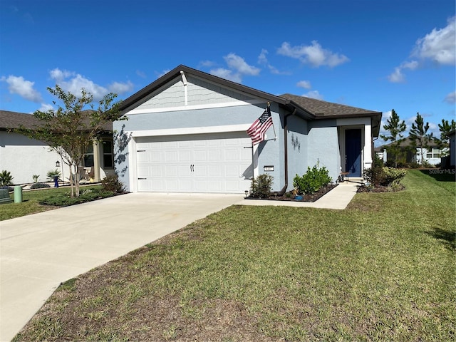 ranch-style home featuring a garage and a front lawn