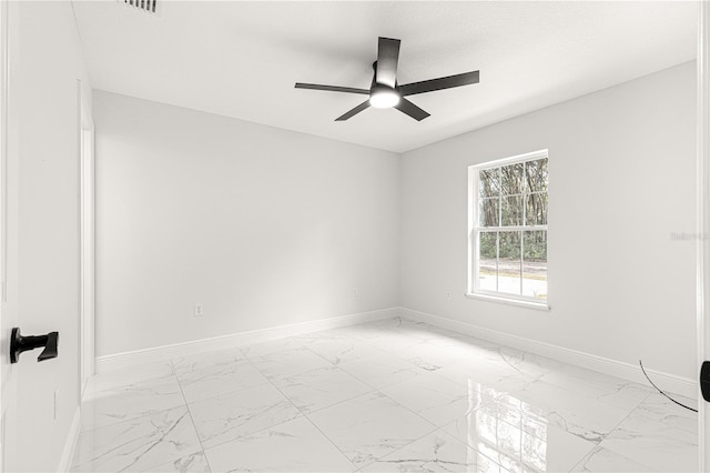 unfurnished room featuring ceiling fan