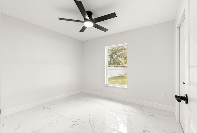 unfurnished room with ceiling fan