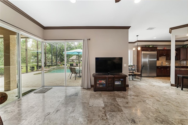 living room with crown molding