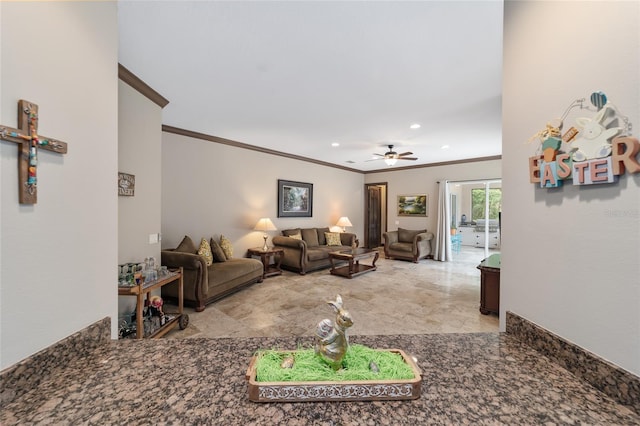 living room with ceiling fan and ornamental molding