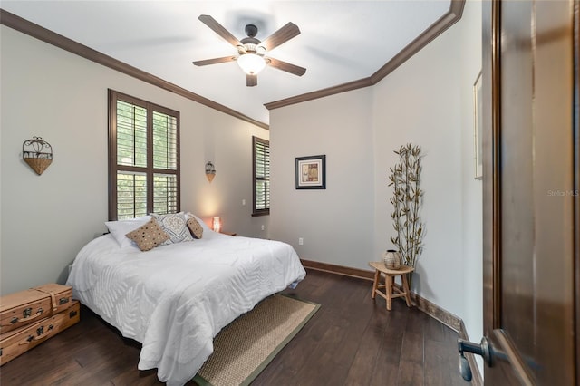 bedroom featuring ceiling fan, crown molding, and dark hardwood / wood-style floors