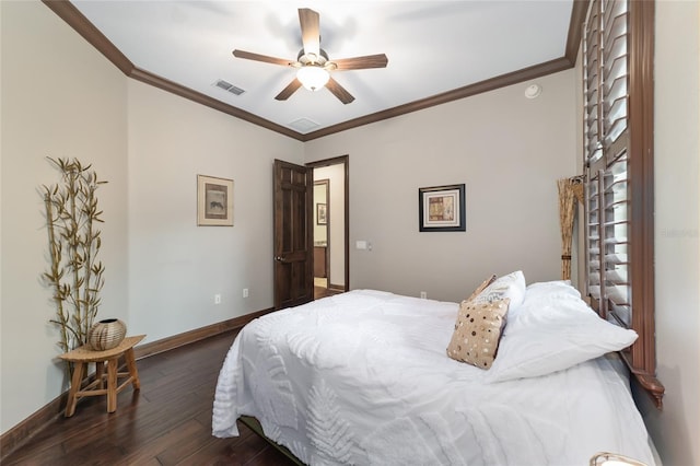 bedroom with crown molding, ceiling fan, and dark wood-type flooring