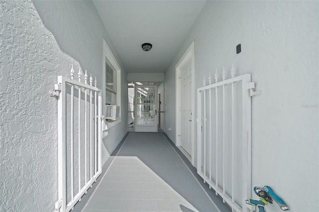 hall featuring tile patterned floors