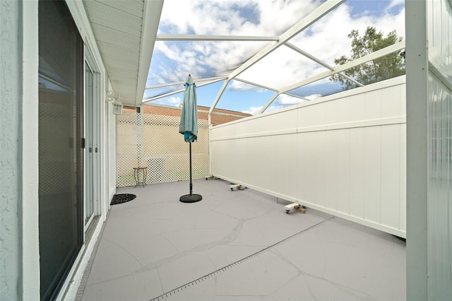 view of patio / terrace with a lanai