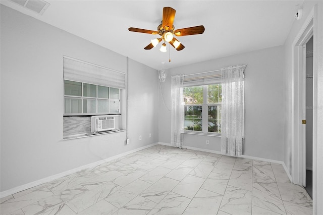 empty room with ceiling fan and cooling unit