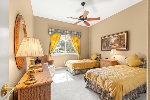 bedroom featuring ceiling fan and carpet floors