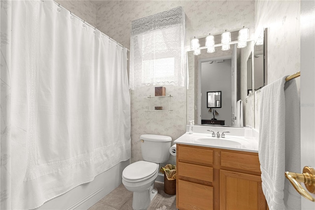 full bathroom with tile patterned floors, vanity, shower / bath combo, and toilet