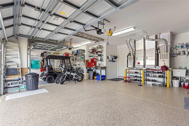 garage with a garage door opener and sink