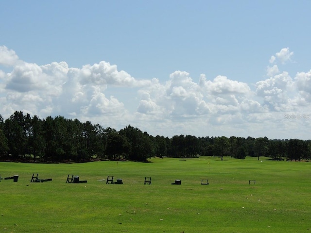 surrounding community with a lawn