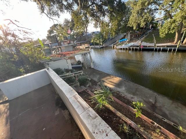 view of dock with a water view