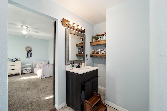 bathroom featuring vanity and ceiling fan