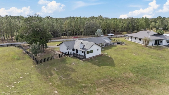 birds eye view of property featuring a rural view