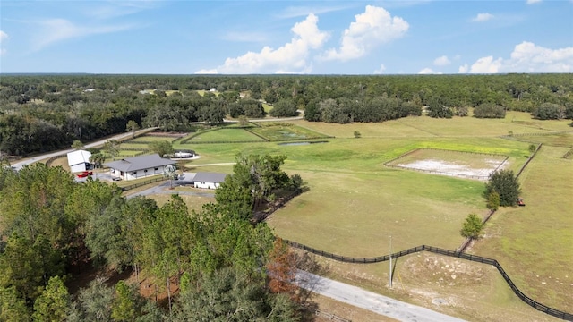 birds eye view of property with a rural view